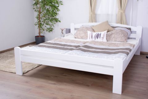 Doppelbett "Easy Premium Line" K4 in Überlänge, 180 x 220 cm Buche Vollholz massiv weiß lackiert
