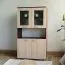 Vitrine Cikupa 43, Farbe: Nuss / Ulme - Abmessungen: 190 x 90 x 40 cm (H x B x T)