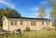 Gartenhaus aus nordischen Fichtenholz, 70 mm Blockbohlenhaus, Grundfläche: 54 m², Außenmaße: 500 x 1100 cm, Fenster und Tür aus Isolierglas, Satteldach