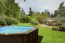 Holz-Pool Sunnydream 07, oval, 8,40 x 4,90 Meter, inklusive Premium Filteranlage, Filtermedium, Poolleiter, Poolfolie, Boden- und Wandvlies, Edelstahl-Eckverbindungen