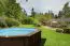 Holz-Pool Sunnydream 07, oval, 8,40 x 4,90 Meter, inklusive Premium Filteranlage, Filtermedium, Poolleiter, Poolfolie, Boden- und Wandvlies, Edelstahl-Eckverbindungen