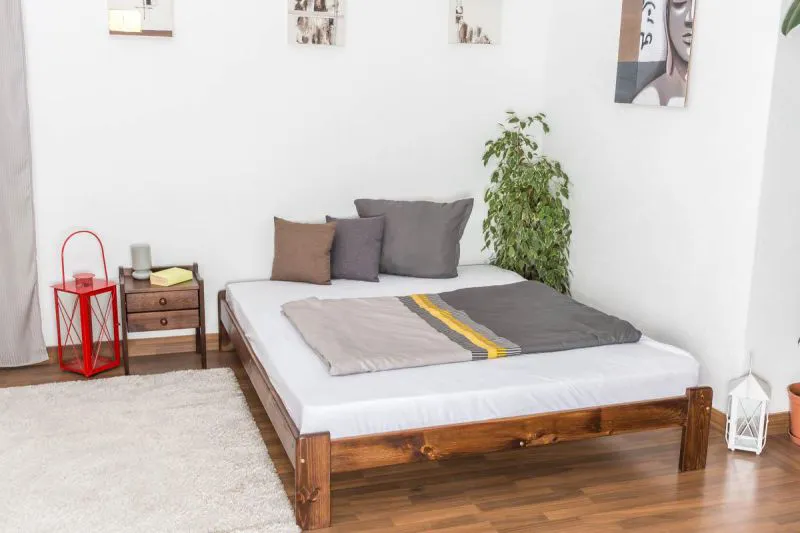 Holzbett 160 x 200 cm Kiefer massiv Nuss Abbildung