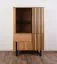 Vitrine Slatina 06, Farbe: Eiche / Schwarz, teilmassiv - Abmessungen: 146 x 91 x 45 cm (H x B x T)